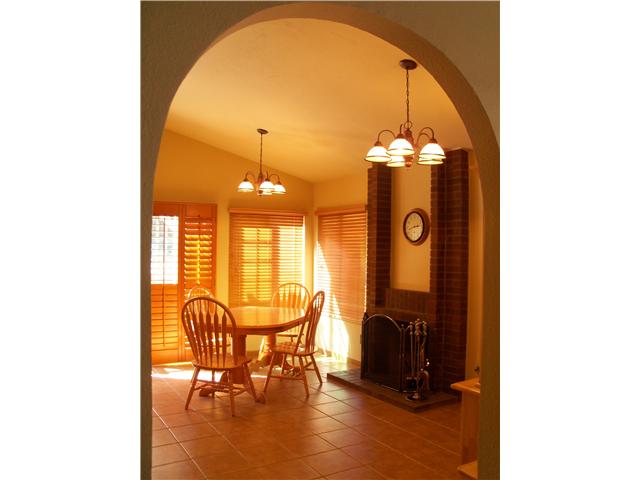 Wow! A kitchen with a toasty fireplace!  Talk about something hard to find!  This will make the perfect backdrop for all of those quiet dinners and fun, festive family gatherings!