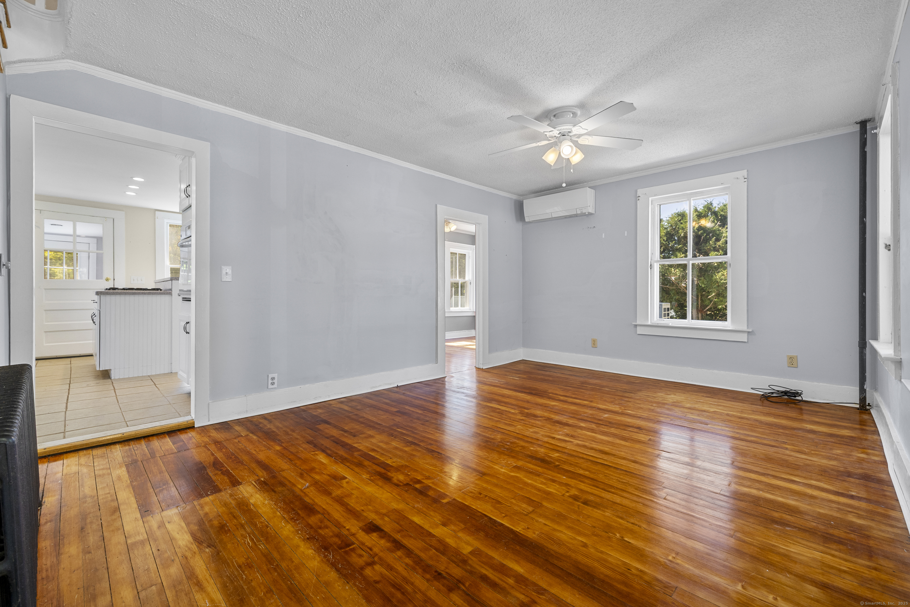 270 Gay Hill Road Montville, CT 06382 - Photo 9 of 35 a view of empty room with wooden floor and fan