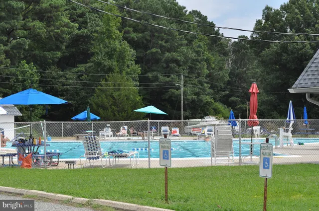 a patio with table and chairs