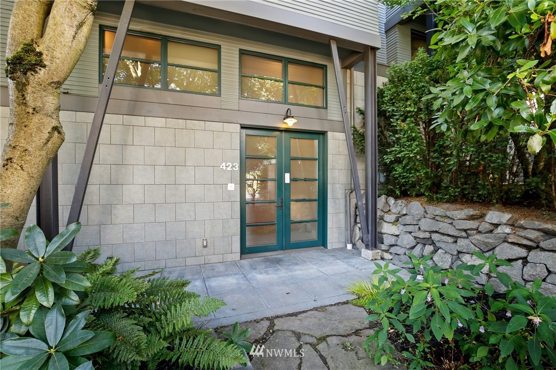 423 Ward Street Seattle, WA 98109 - Photo 34 of 39 a view of a brick house with plants