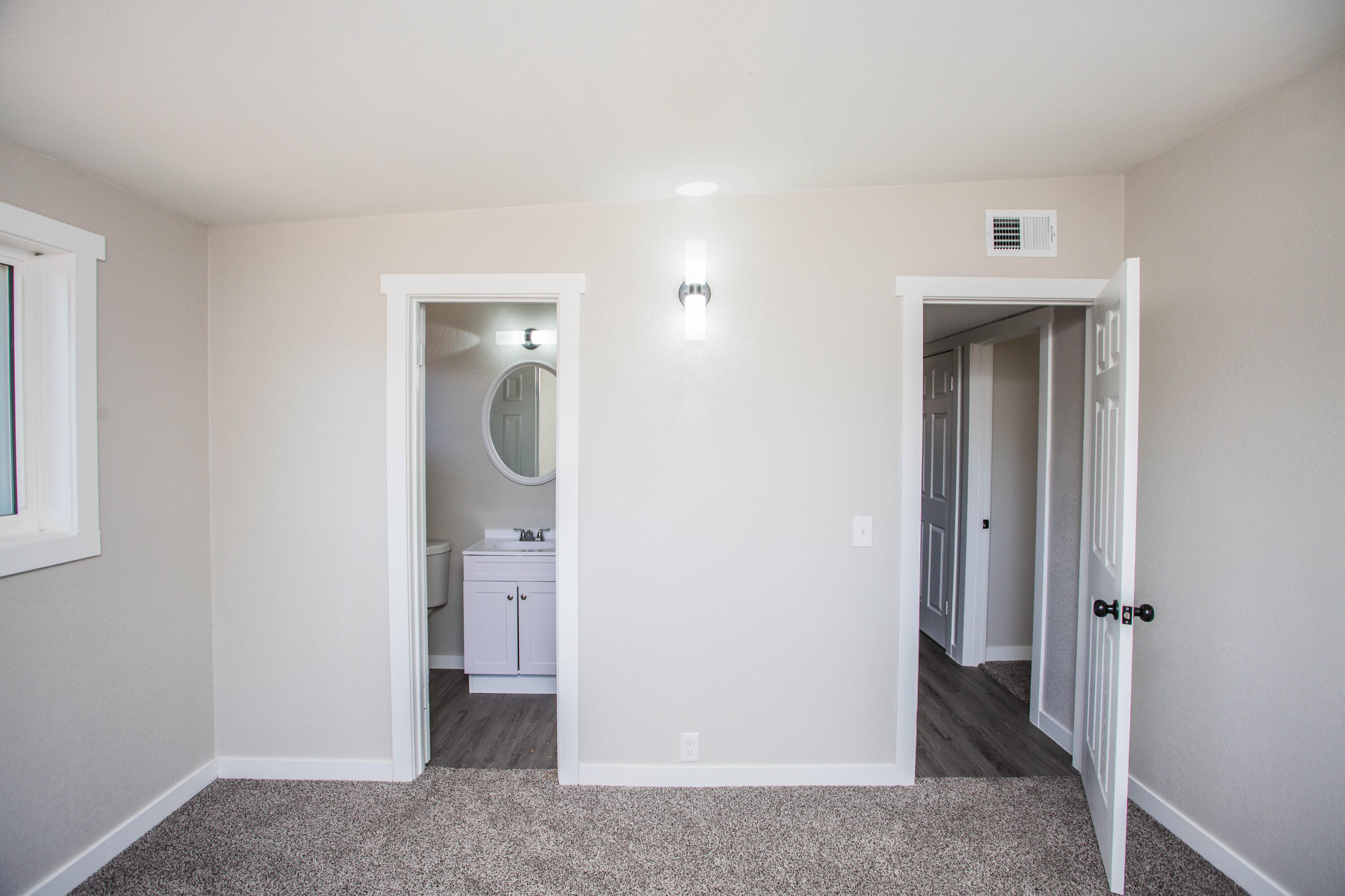 2725 63rd Street Lubbock, TX 79413 - Photo 27 of 41 a view of a hallway to rooms