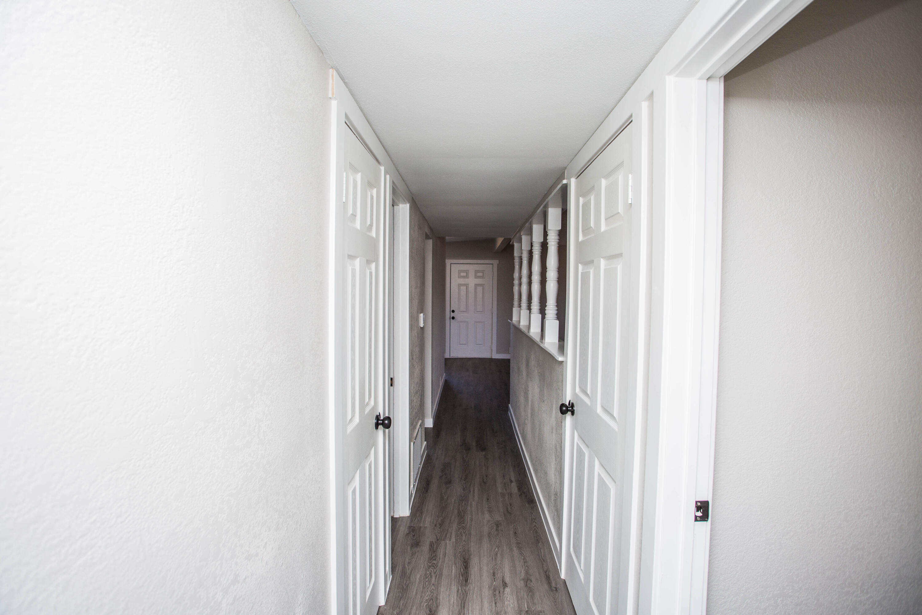 2725 63rd Street Lubbock, TX 79413 - Photo 28 of 41 a view of a hallway with wooden floor and entryway