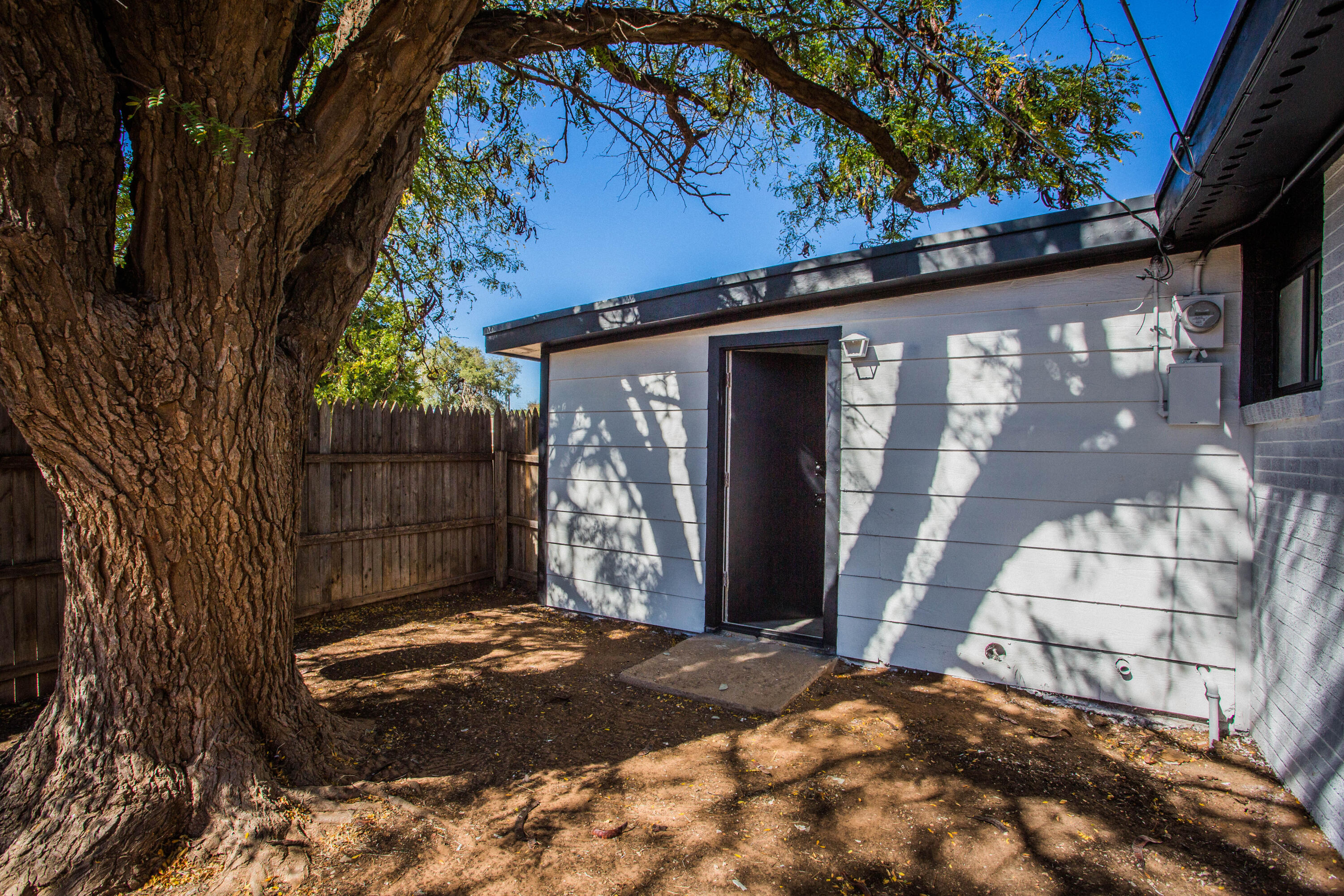 2725 63rd Street Lubbock, TX 79413 - Photo 41 of 41 a front view of a house with a yard