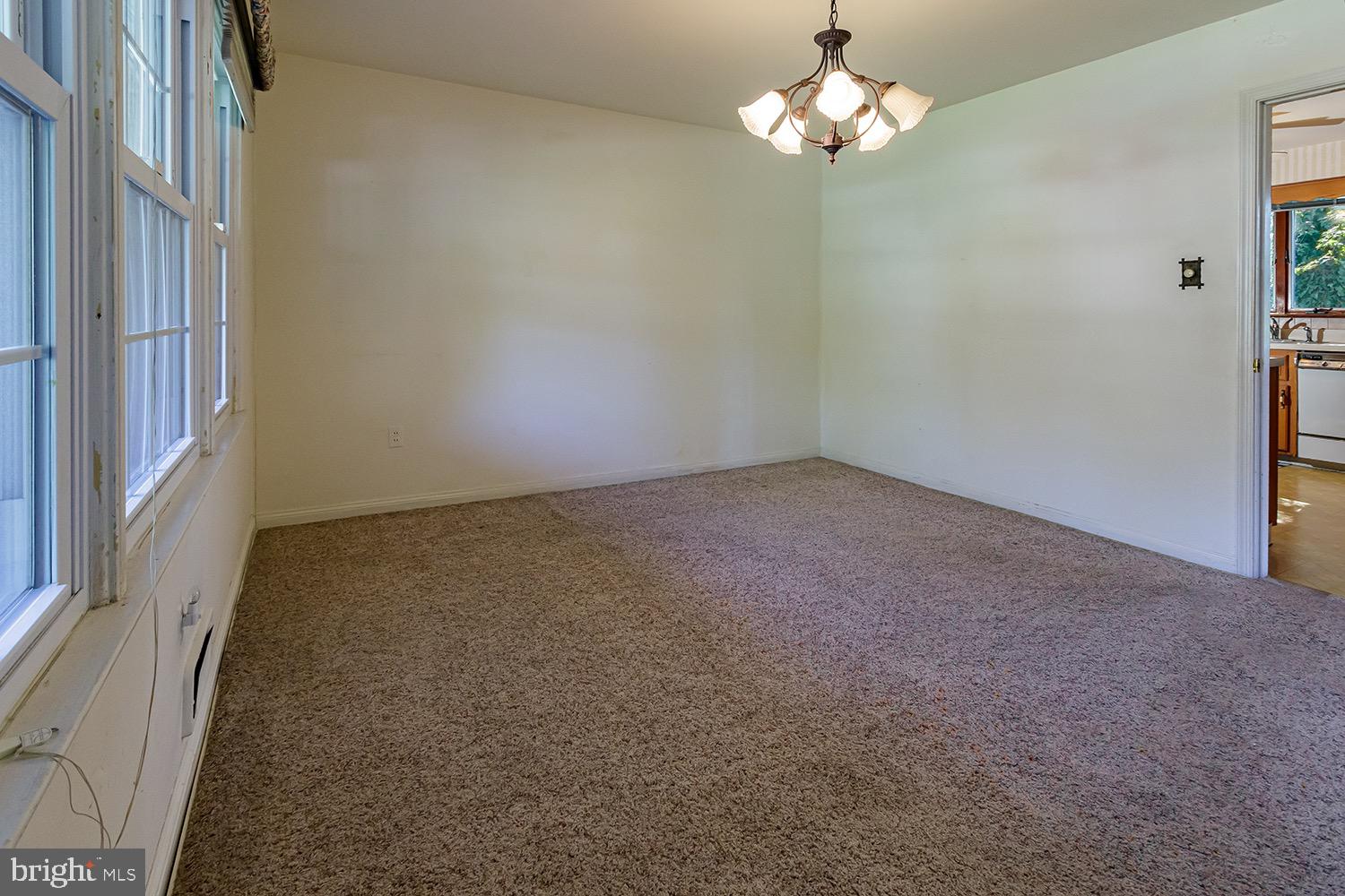 908 Hilltop Road Cinnaminson, NJ 08077 - Photo 13 of 30 Dining Room with 3 window -Hardwood under carpet