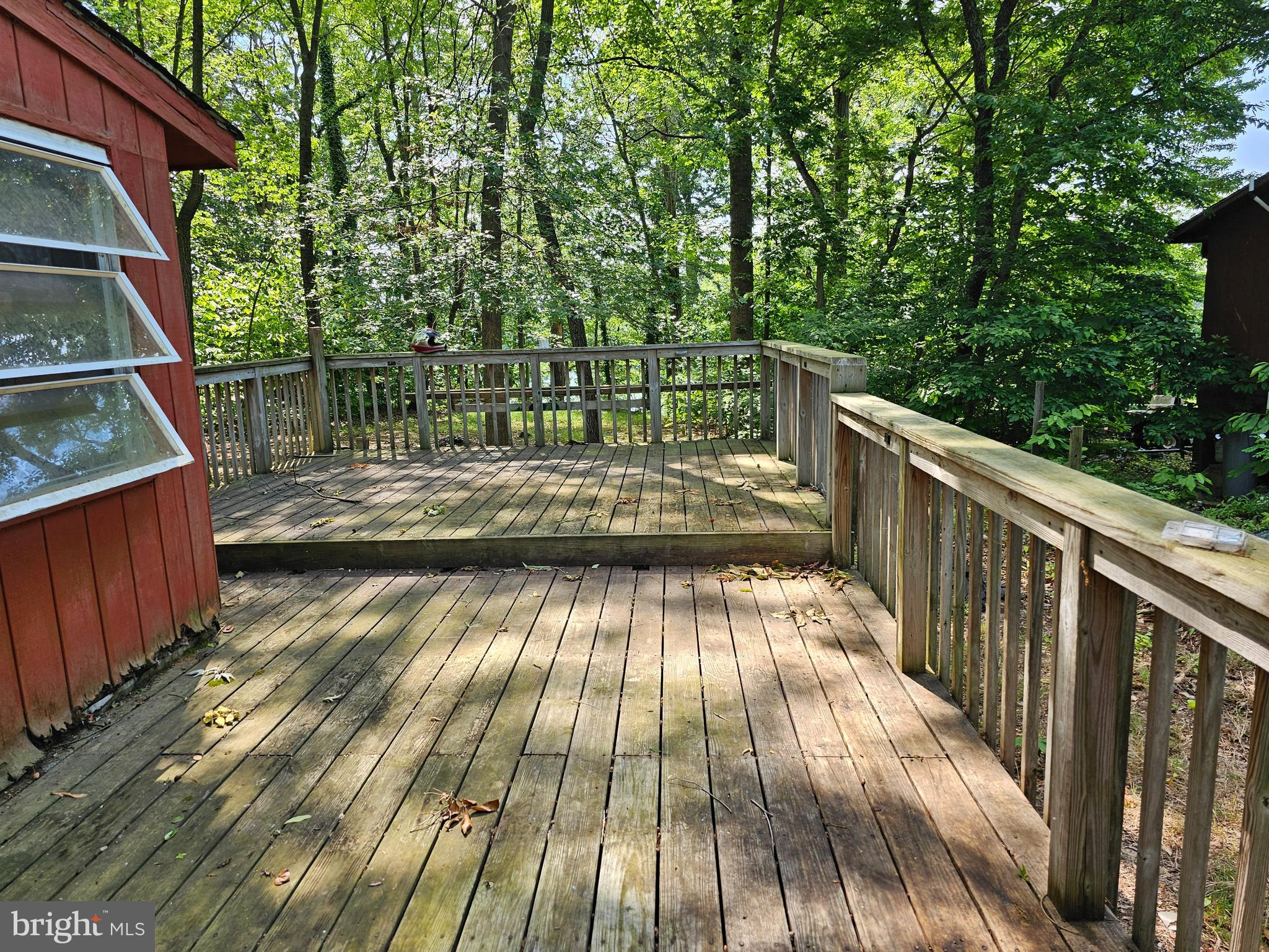 59 A Yutan Lane, Unit GLEN 6 Earleville, MD 21919 - Photo 5 of 8 a view of balcony with wooden floor and fence
