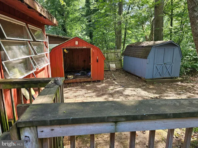 a view of a house with a window and wooden floor