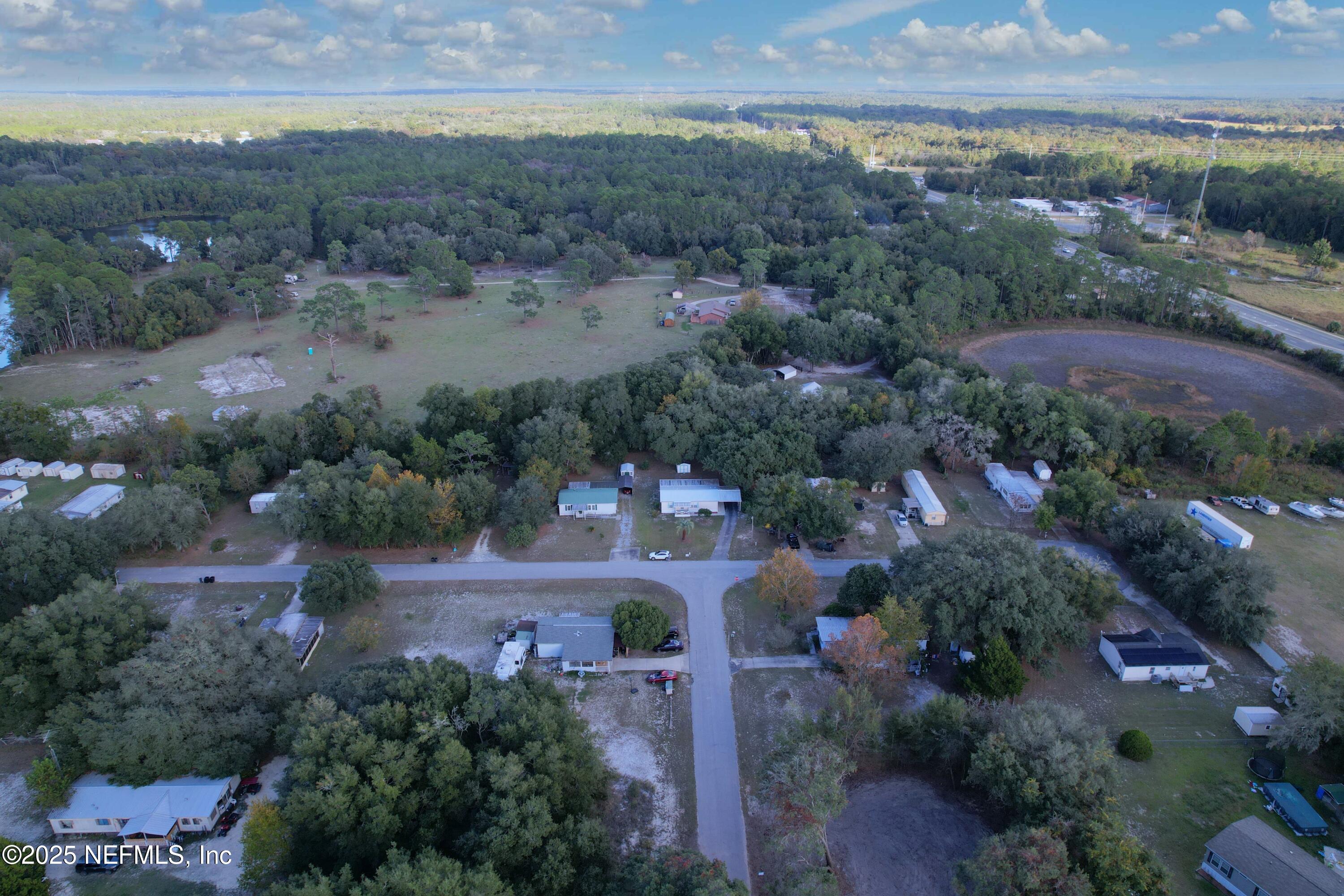 106 Ridgewood Avenue Interlachen, FL 32148 - Photo 17 of 23 an aerial view of multiple house