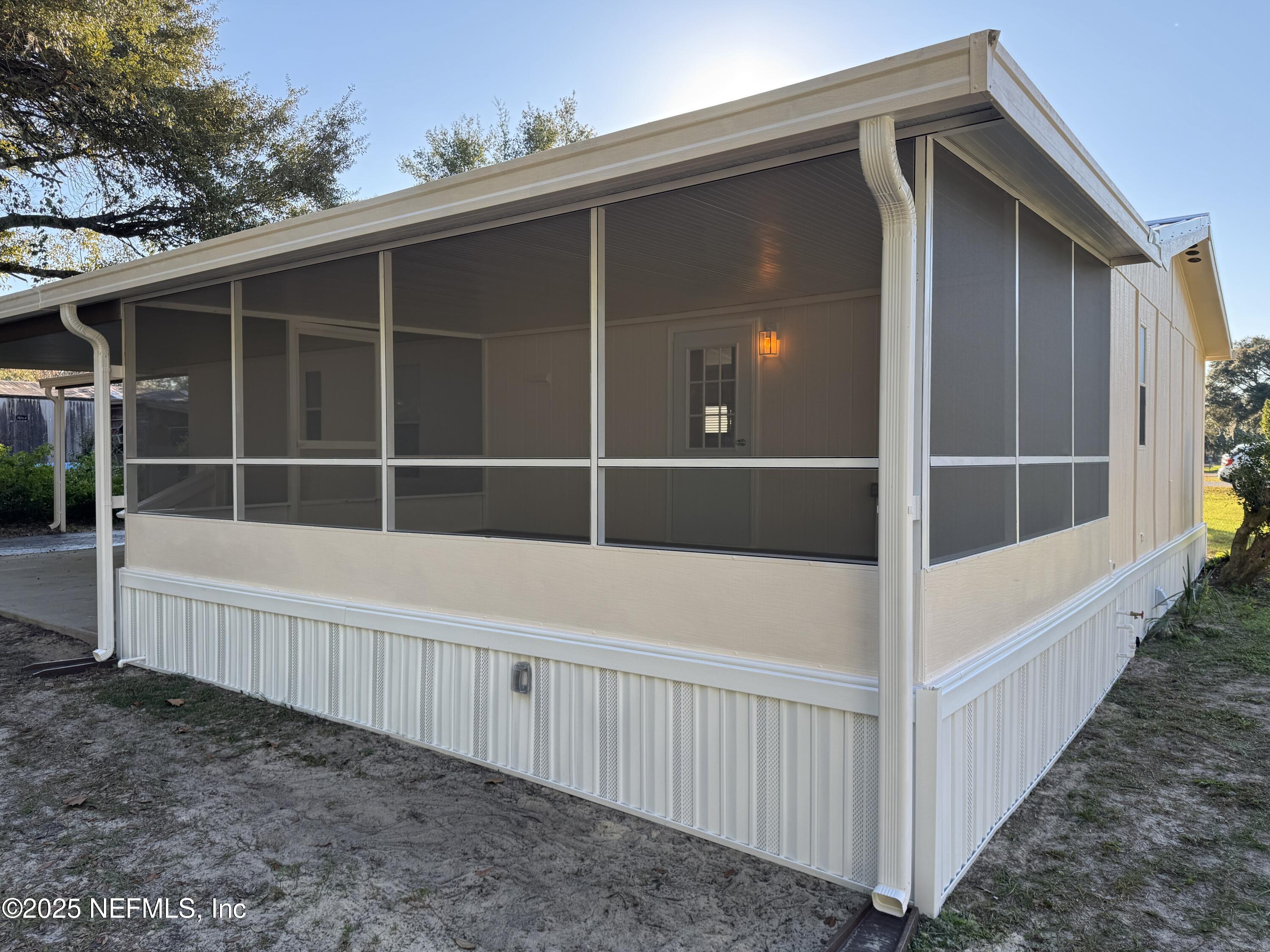 106 Ridgewood Avenue Interlachen, FL 32148 - Photo 4 of 23 a view of a balcony