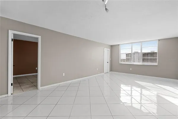a view of a chandelier fan in a room
