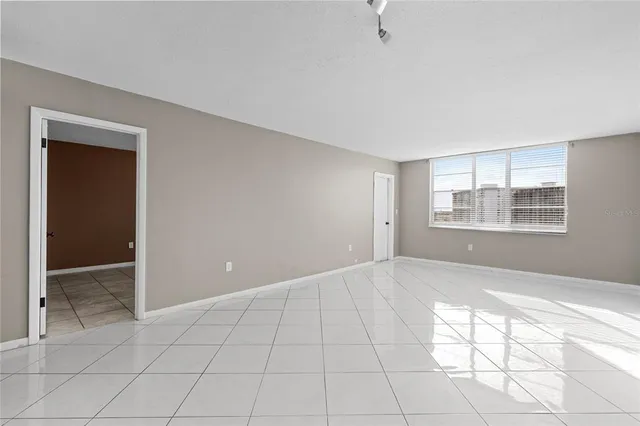 a view of a chandelier fan in a room