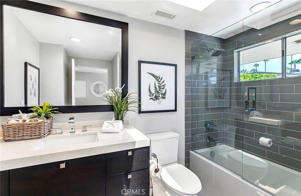 2526 Monaco Drive Laguna Beach, CA 92651 - Photo 34 of 59 a bathroom with a sink toilet and shower
