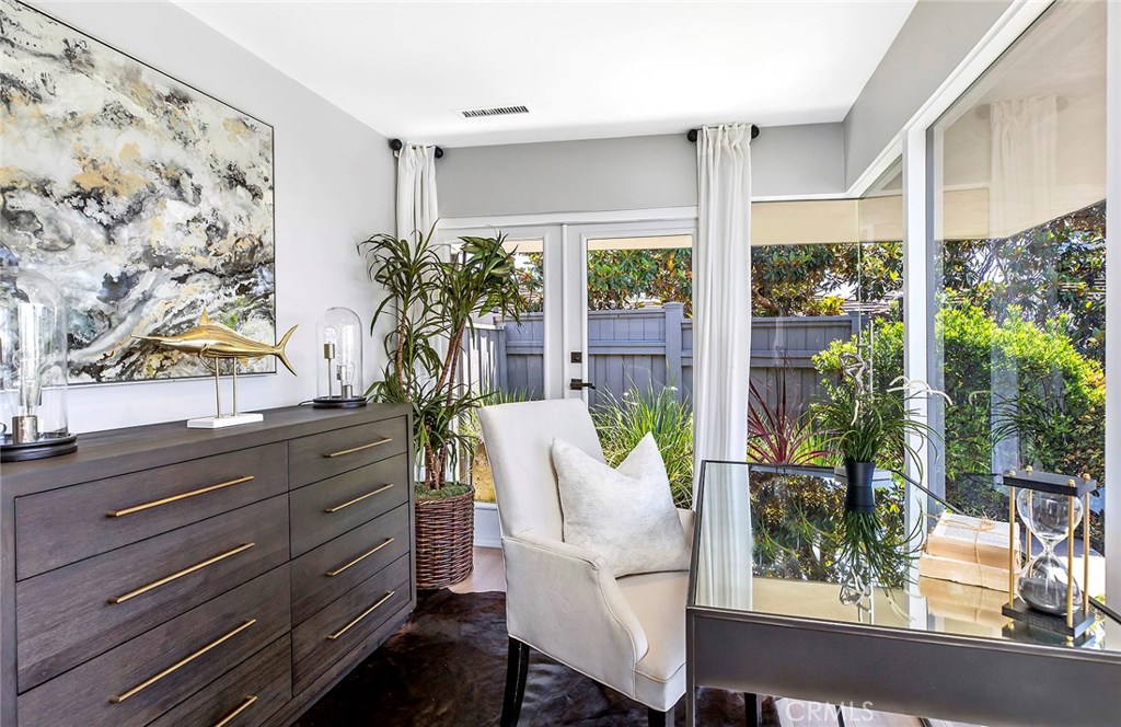 2526 Monaco Drive Laguna Beach, CA 92651 - Photo 36 of 59 a living room with furniture and a potted plant