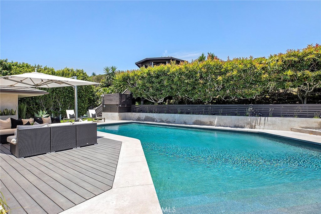 2526 Monaco Drive Laguna Beach, CA 92651 - Photo 40 of 59 a view of a swimming pool with a patio