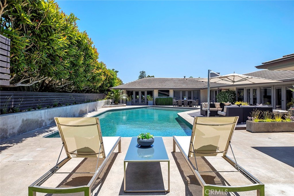 2526 Monaco Drive Laguna Beach, CA 92651 - Photo 43 of 59 a view of a patio with table and chairs and potted plants