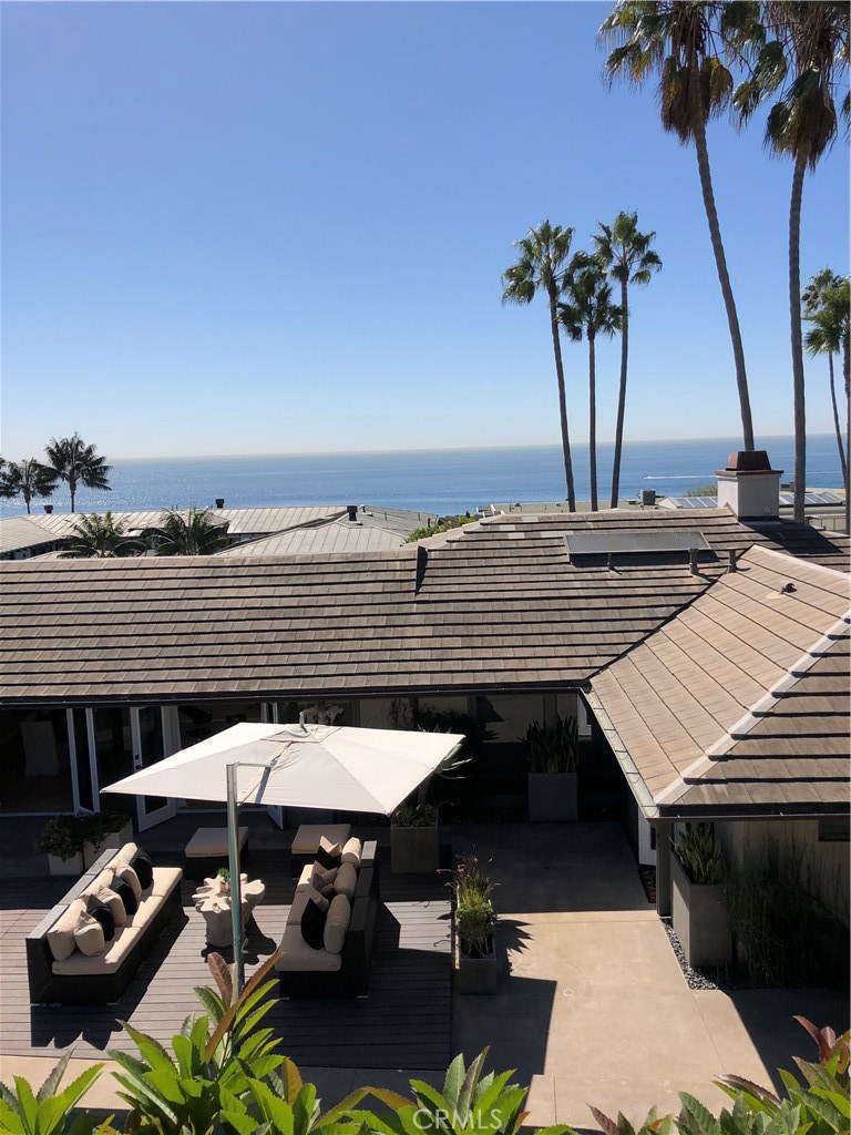 2526 Monaco Drive Laguna Beach, CA 92651 - Photo 47 of 59 a terrace of a house with outdoor seating
