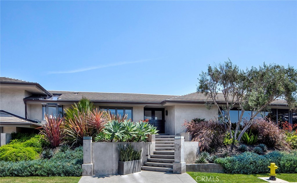 2526 Monaco Drive Laguna Beach, CA 92651 - Photo 48 of 59 a front view of a house with a yard