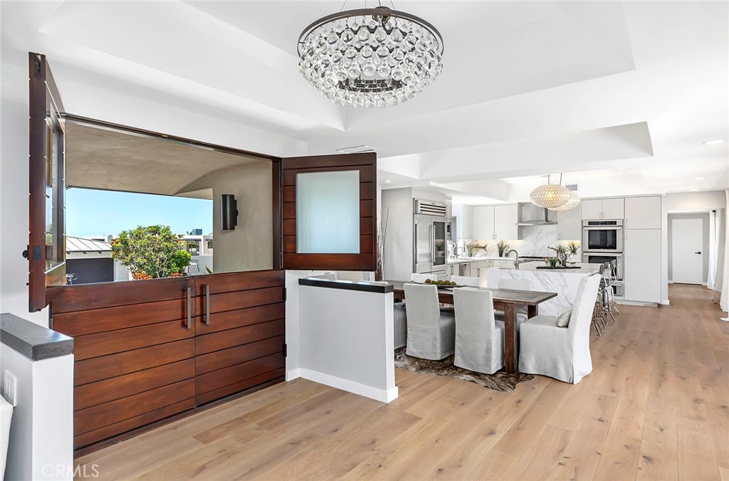 2526 Monaco Drive Laguna Beach, CA 92651 - Photo 8 of 59 a kitchen with a sink and cabinets