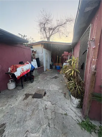 a view of a garage with a table and chairs