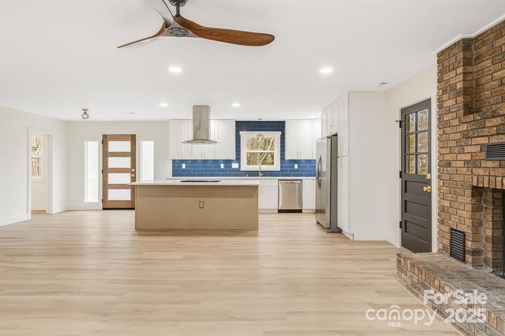 7 Angus Lane Asheville, NC 28805 - Photo 11 of 45 a view of kitchen with granite countertop cabinets and refrigerator