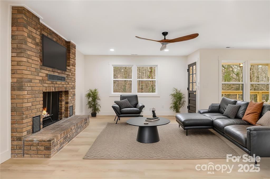 7 Angus Lane Asheville, NC 28805 - Photo 13 of 45 a living room with furniture and a fireplace