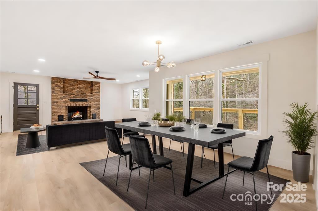 7 Angus Lane Asheville, NC 28805 - Photo 15 of 45 a view of a dining room with furniture window and outside view