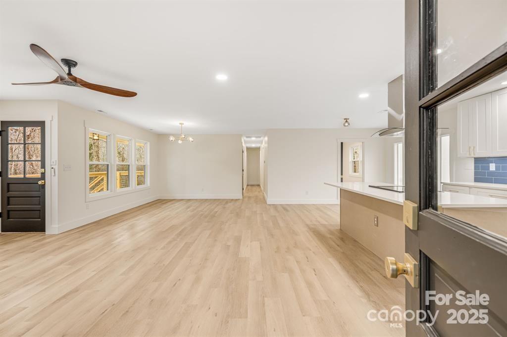 7 Angus Lane Asheville, NC 28805 - Photo 17 of 45 a view of an empty room and a window