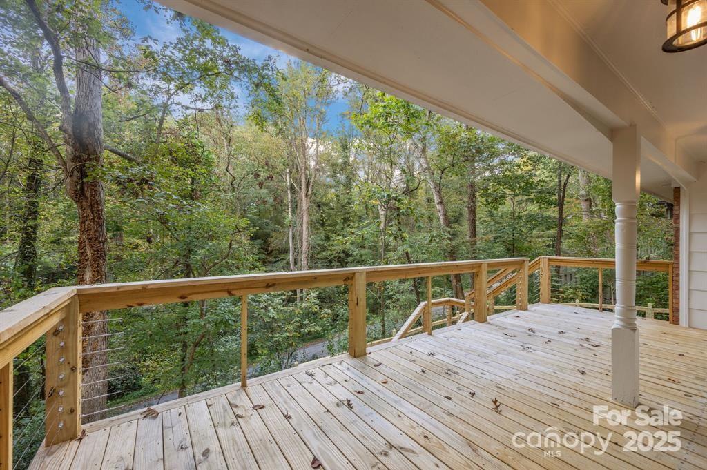 7 Angus Lane Asheville, NC 28805 - Photo 19 of 45 a view of balcony with deck and wooden floor