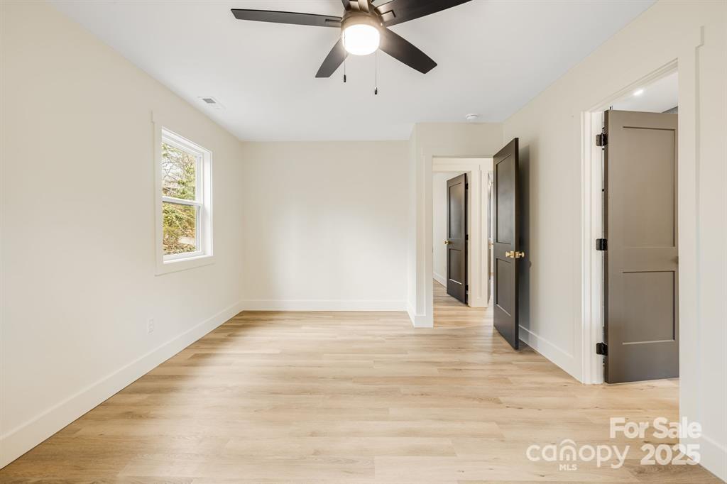 7 Angus Lane Asheville, NC 28805 - Photo 26 of 45 a view of an empty room with a window