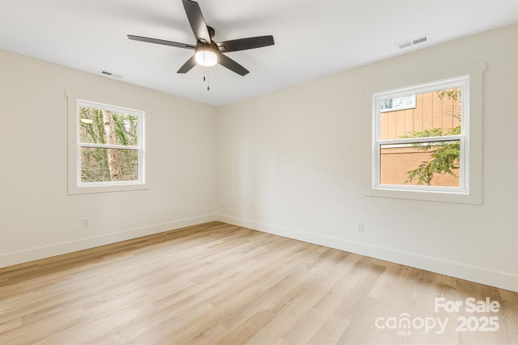 7 Angus Lane Asheville, NC 28805 - Photo 27 of 45 a view of an empty room with a window