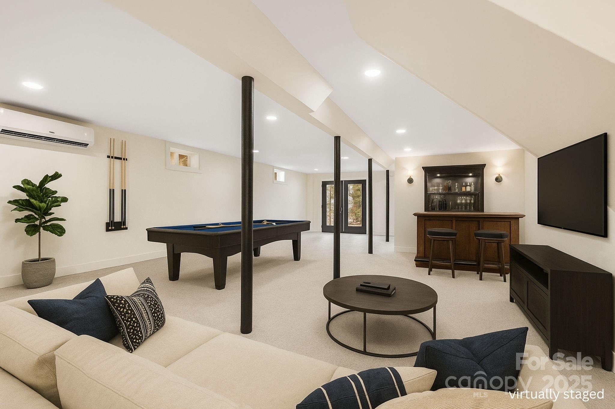 7 Angus Lane Asheville, NC 28805 - Photo 36 of 45 a living room with furniture and a flat screen tv