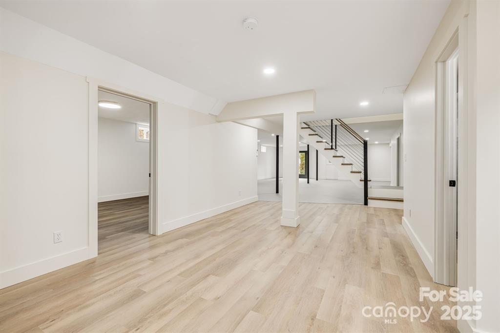 7 Angus Lane Asheville, NC 28805 - Photo 37 of 45 a view of empty room with wooden floor