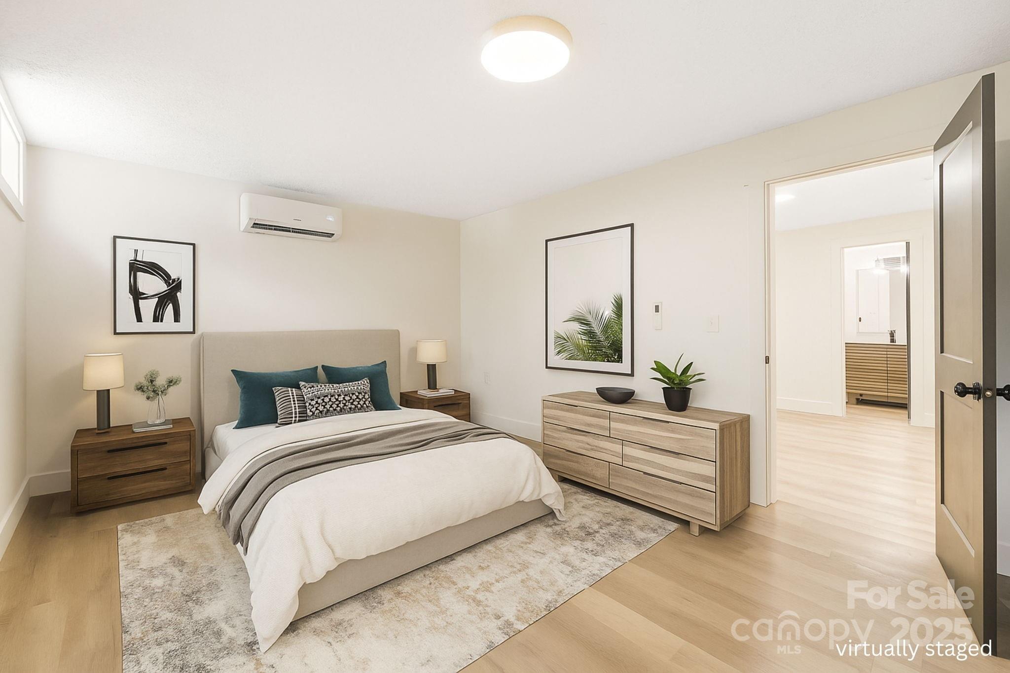 7 Angus Lane Asheville, NC 28805 - Photo 43 of 45 a bedroom with a bed and window