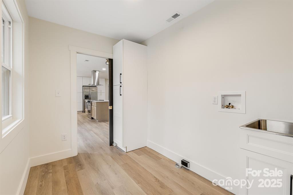 7 Angus Lane Asheville, NC 28805 - Photo 10 of 45 a view of a kitchen from the hallway