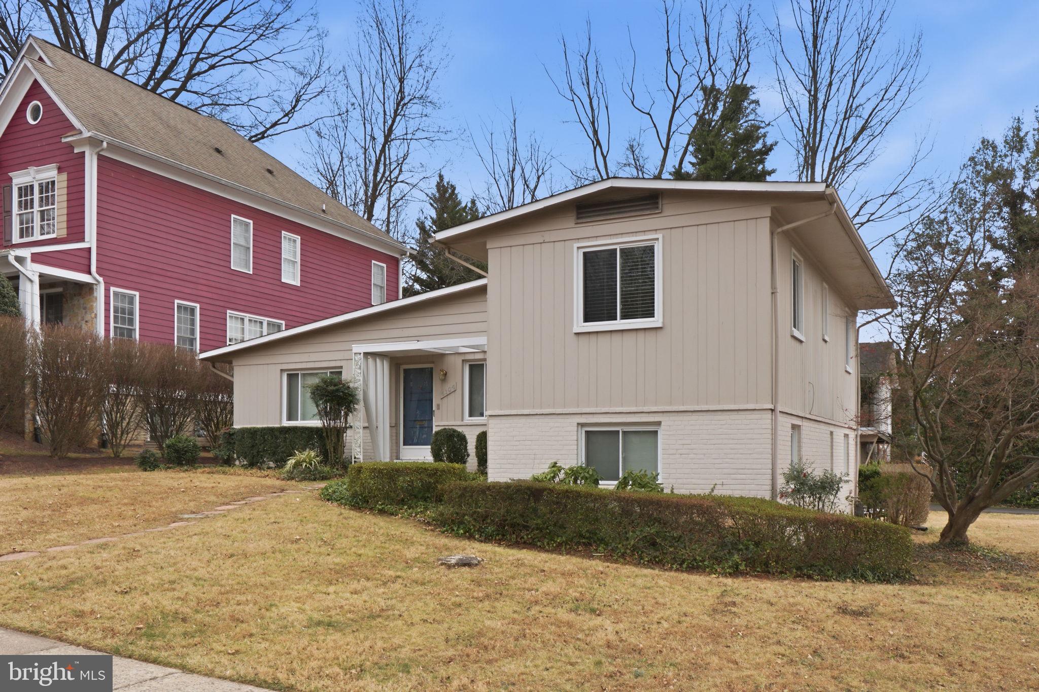 6104 Kirby Road Bethesda, MD 20817 - Photo 4 of 7 a front view of a house with a yard