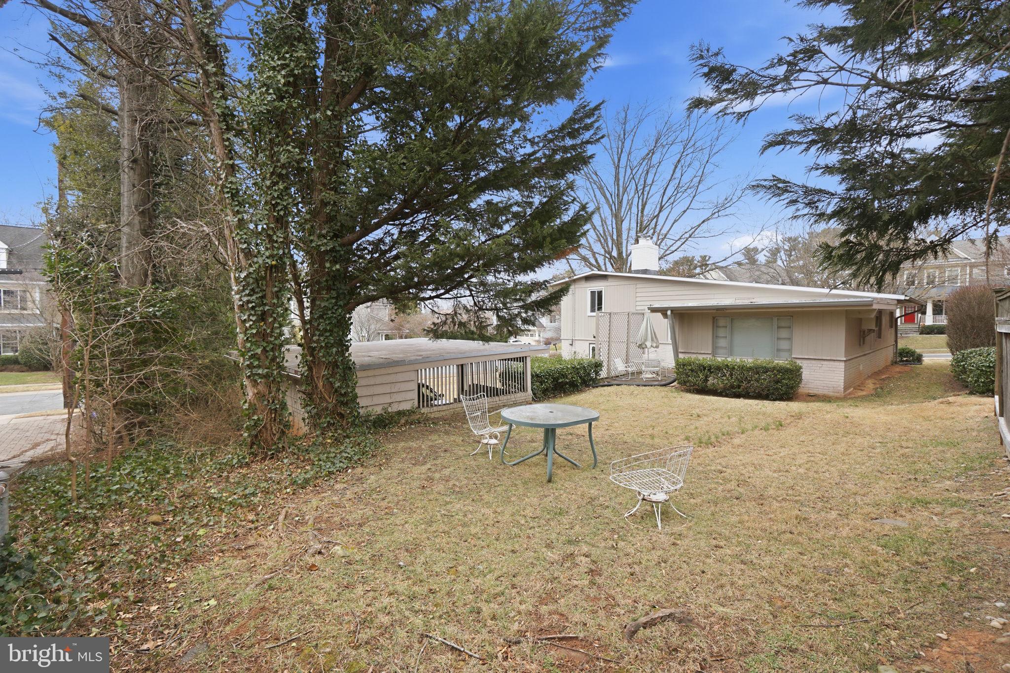6104 Kirby Road Bethesda, MD 20817 - Photo 5 of 7 a white house that has a tree in front of it