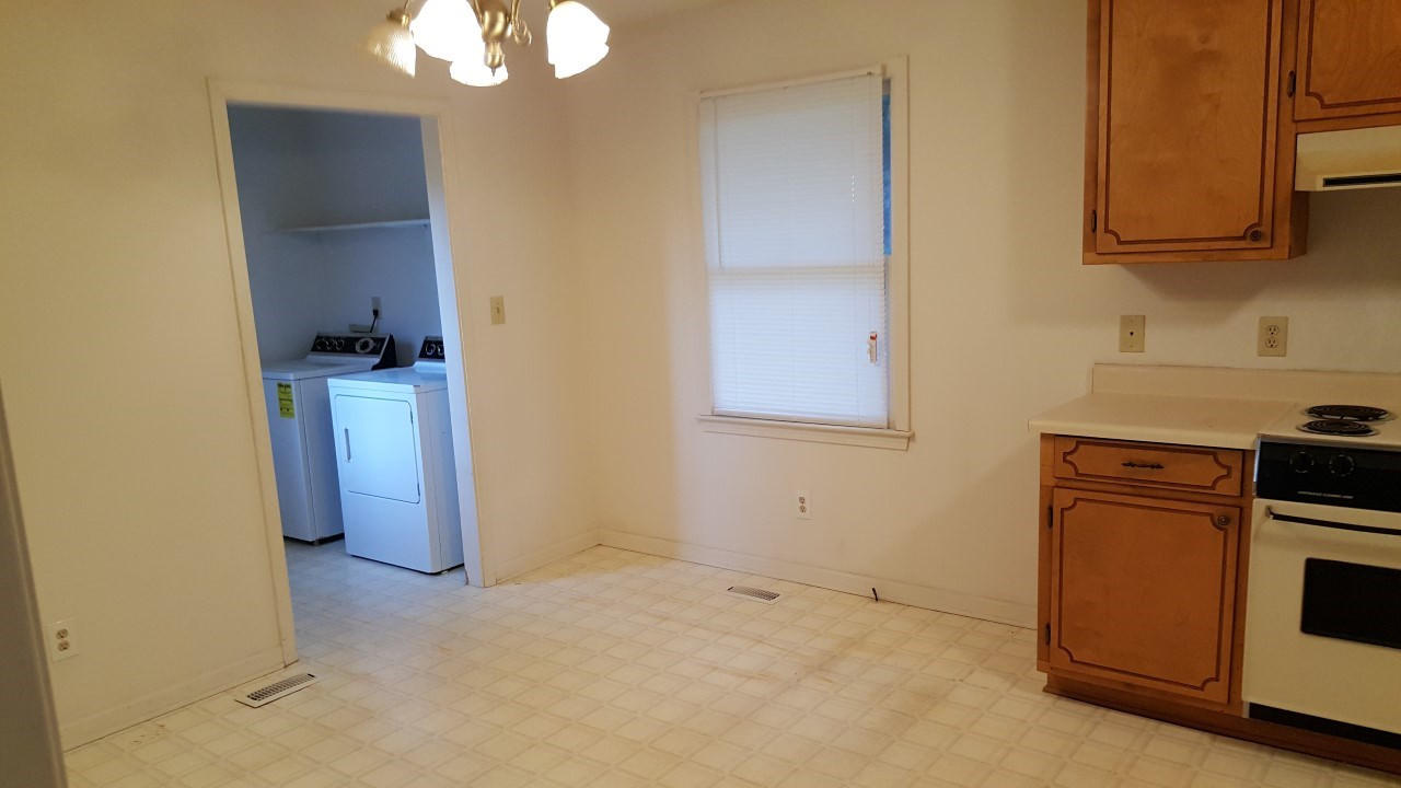 Breakfast area looking into the laundry room. Breakfast Area