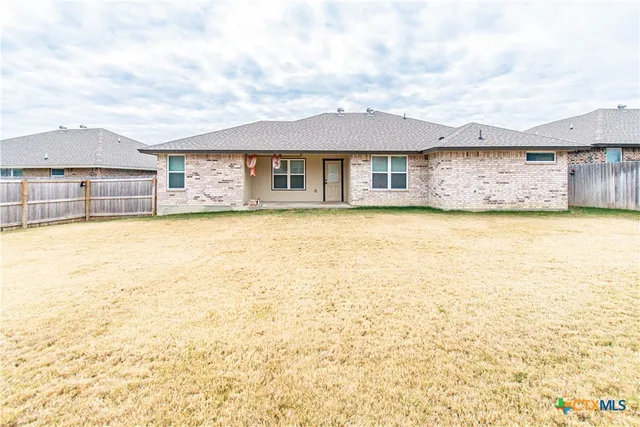a view of a house with a terrace