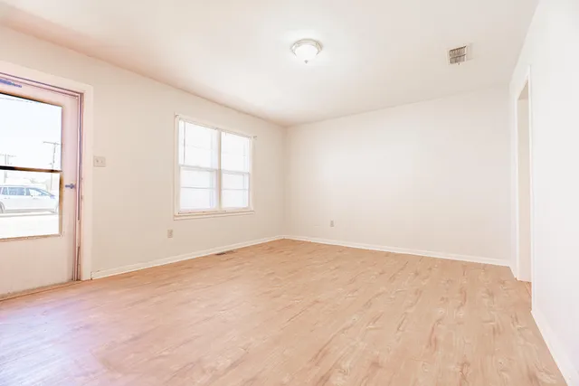 an empty room with windows