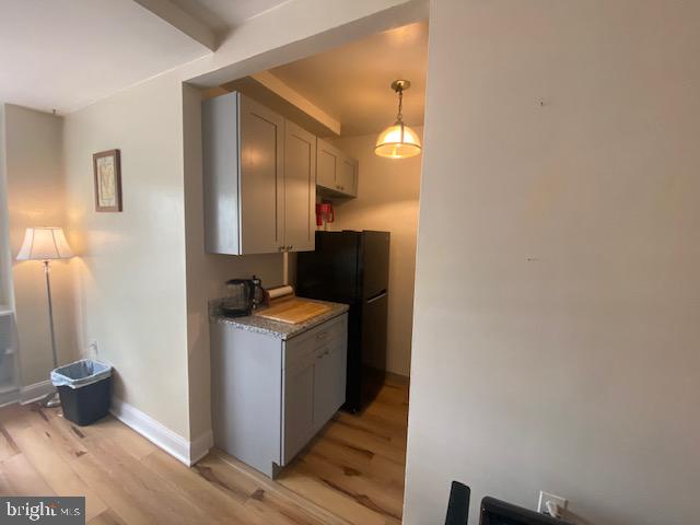 1121 Arlington Boulevard, Unit 325 Arlington, VA 22209 - Photo 7 of 39 a kitchen with a stove and a refrigerator