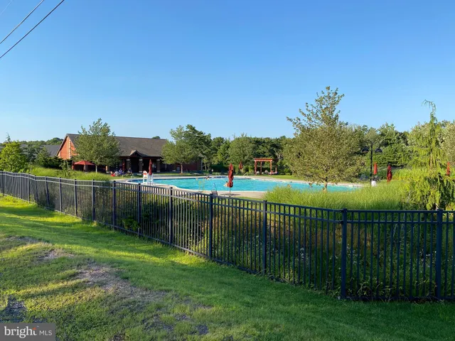 a room with furniture and pool table