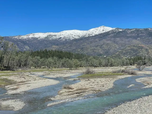 a view of a lake with outdoor space