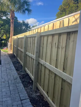 a view of a wooden fence