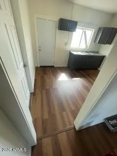 a view of balcony with wooden floor