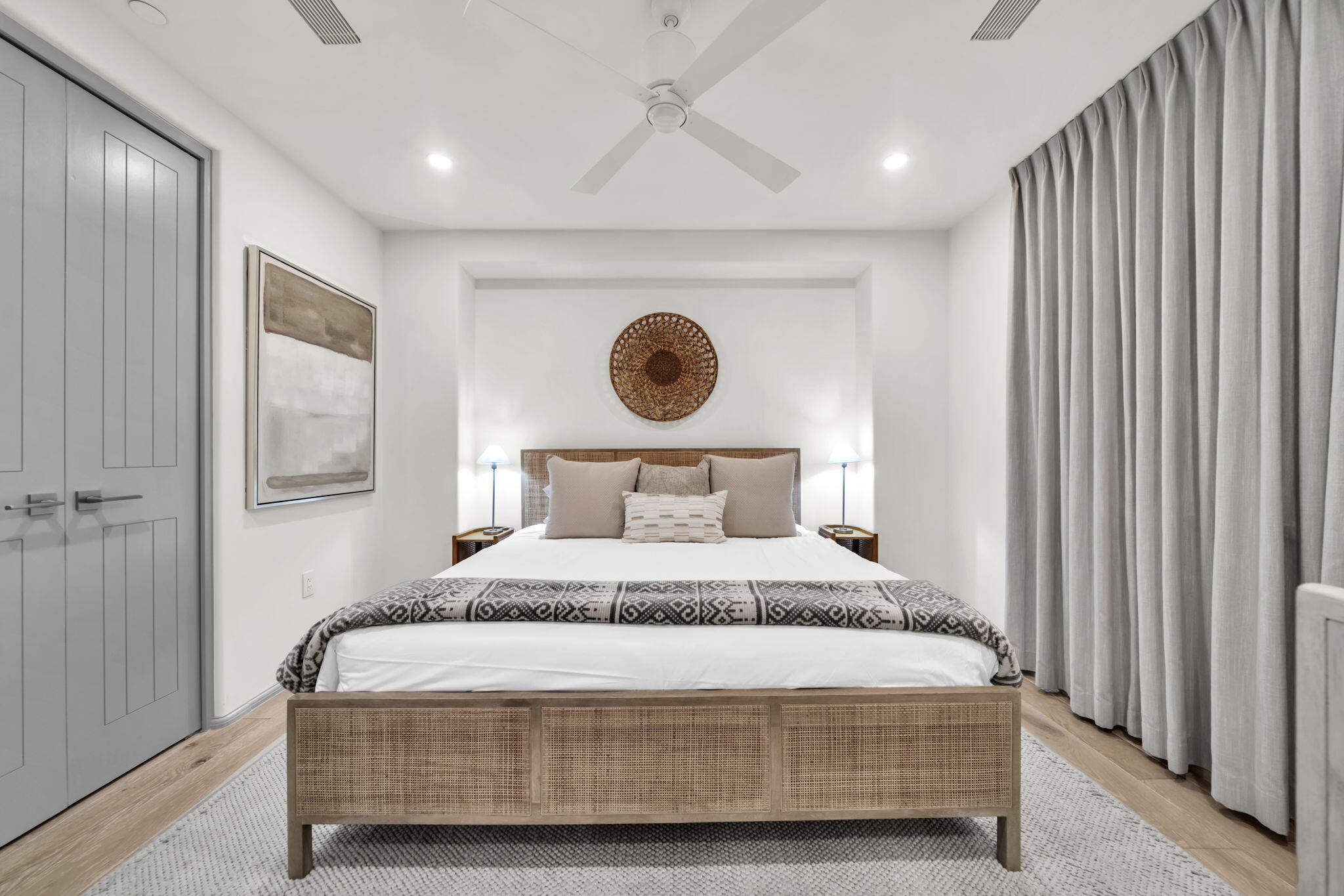 45 West Solaire Way Inlet Beach, Unit 207 Inlet Beach, FL 32461 - Photo 16 of 55 a bedroom with a bed and lamp