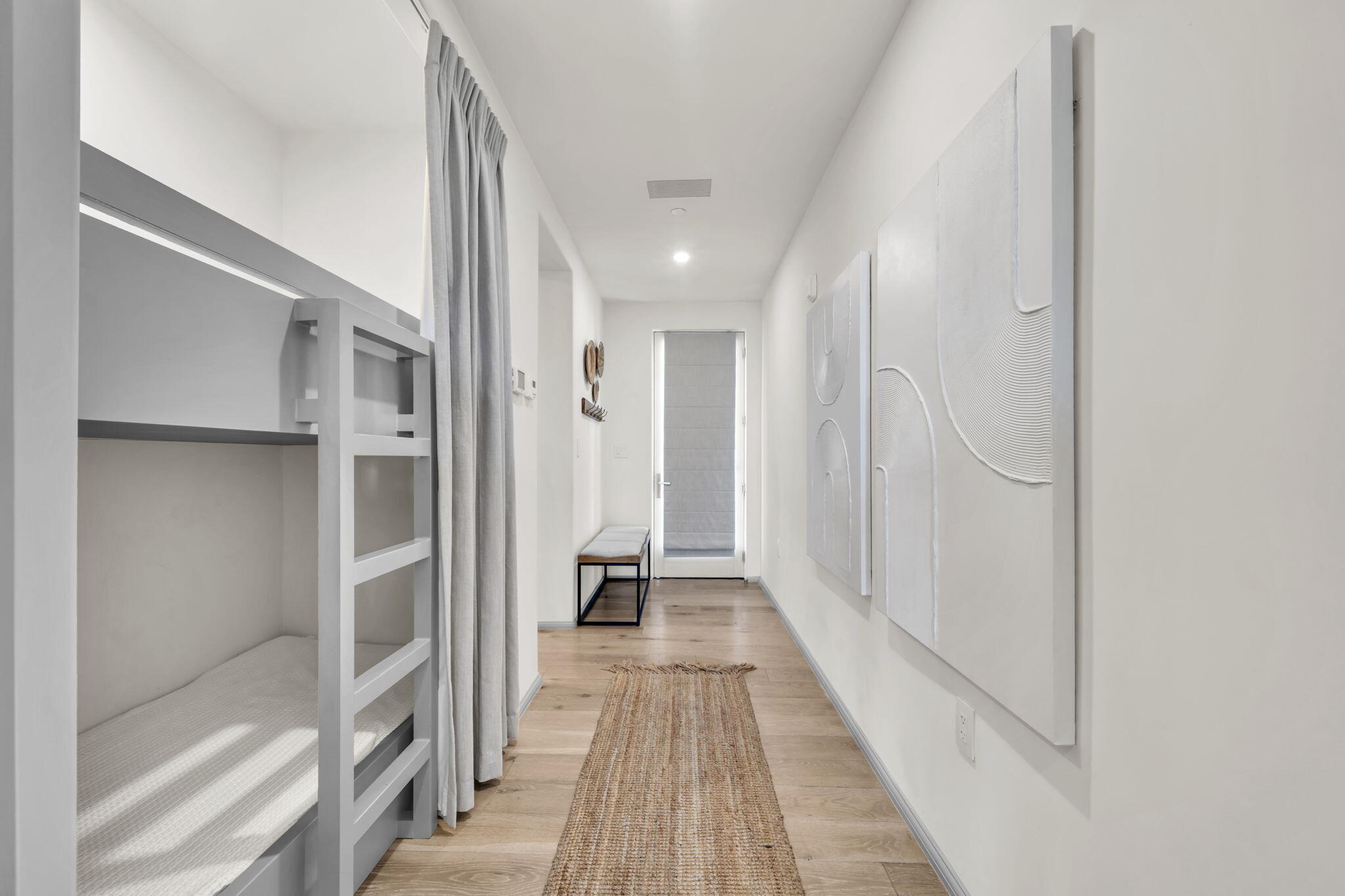 45 West Solaire Way Inlet Beach, Unit 207 Inlet Beach, FL 32461 - Photo 18 of 55 a view of a hallway with wooden floor and staircase