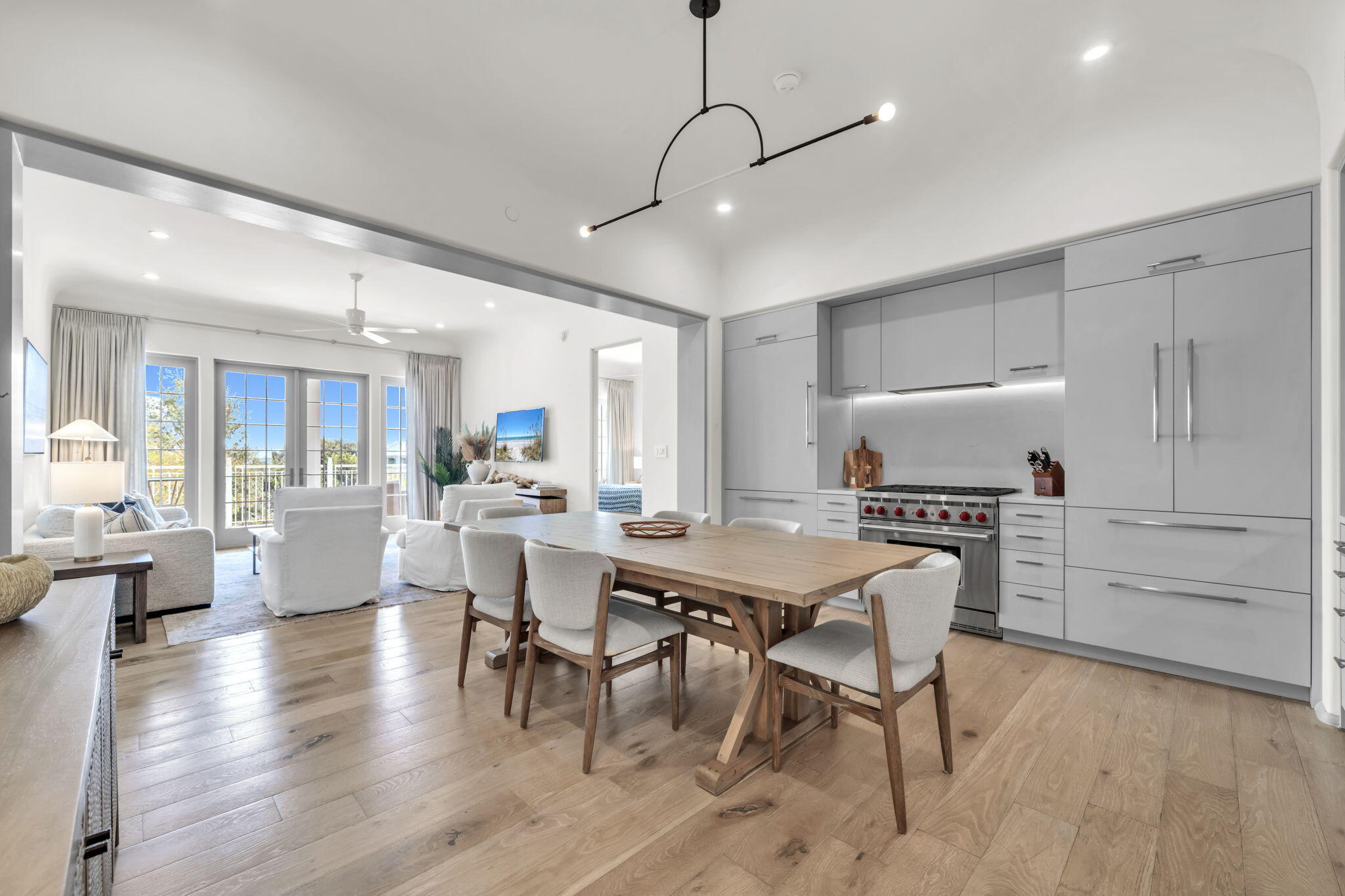 45 West Solaire Way Inlet Beach, Unit 207 Inlet Beach, FL 32461 - Photo 19 of 55 a view of a dining room with furniture window and wooden floor