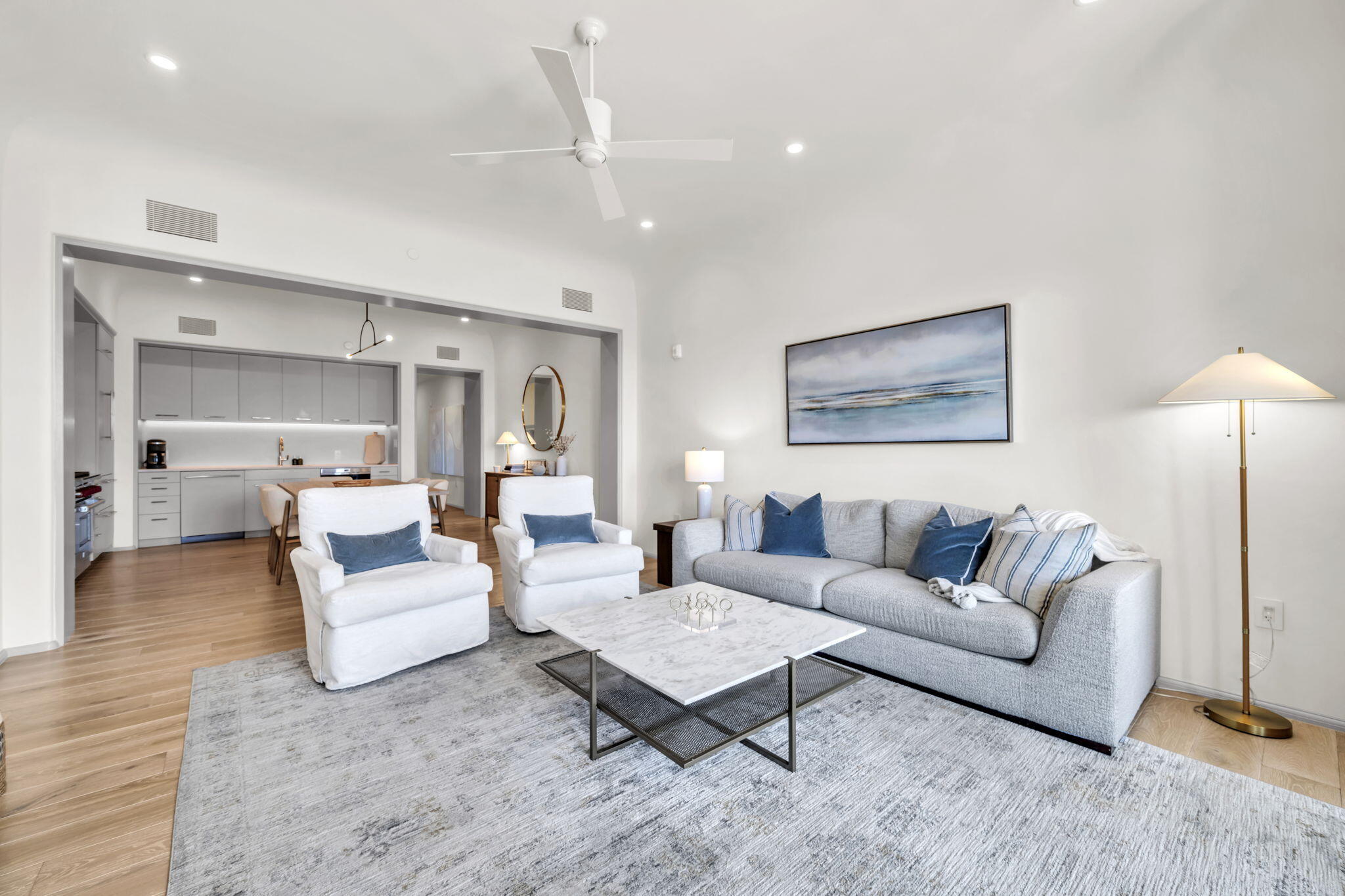 45 West Solaire Way Inlet Beach, Unit 207 Inlet Beach, FL 32461 - Photo 25 of 55 a living room with furniture and a lamp