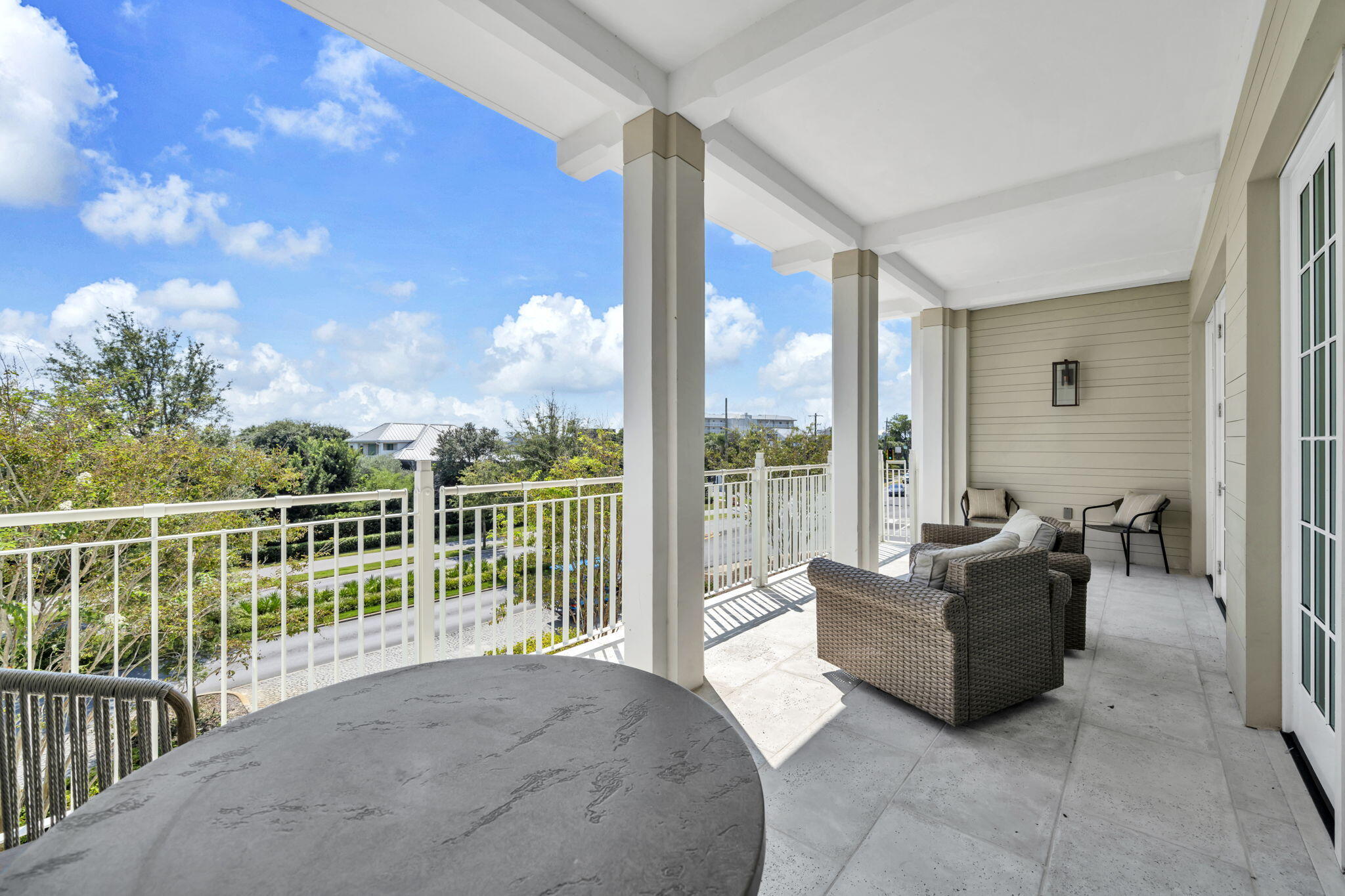 45 West Solaire Way Inlet Beach, Unit 207 Inlet Beach, FL 32461 - Photo 33 of 55 a spacious bedroom with a large bed and a balcony