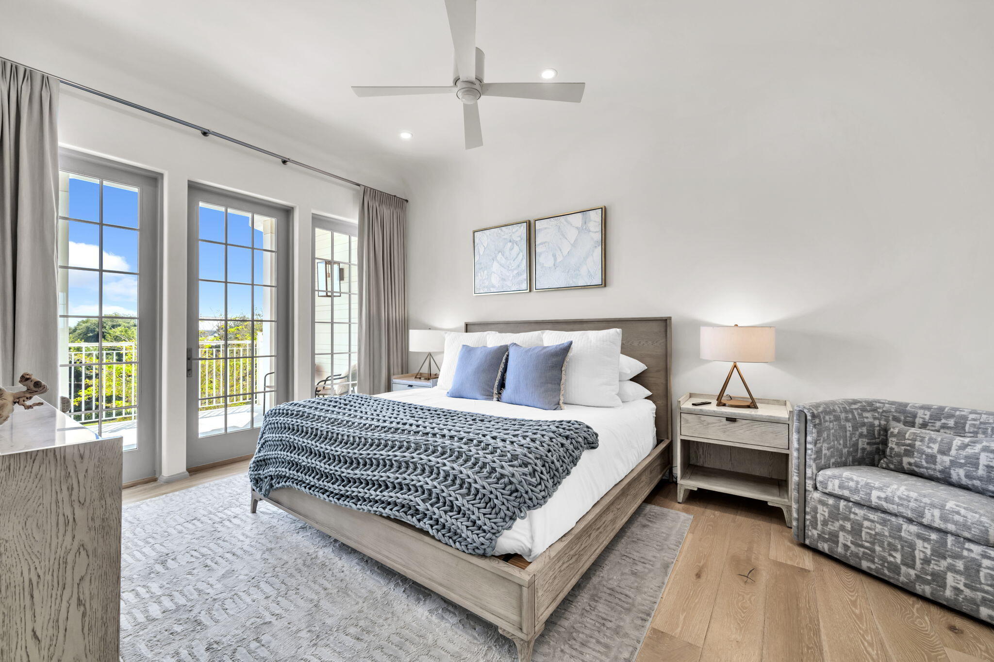 45 West Solaire Way Inlet Beach, Unit 207 Inlet Beach, FL 32461 - Photo 4 of 55 a bedroom with a large bed and a couch