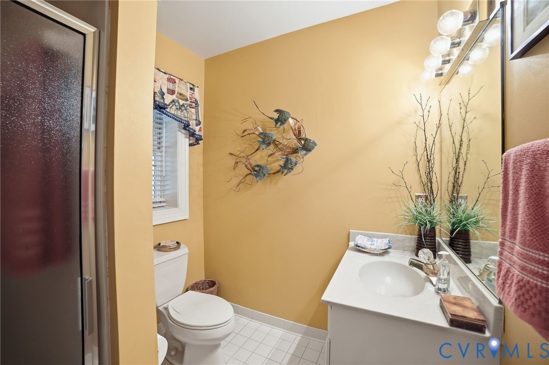 3950 Reeds Landing Circle Midlothian, VA 23113 - Photo 35 of 50 a bathroom with a sink toilet and shower
